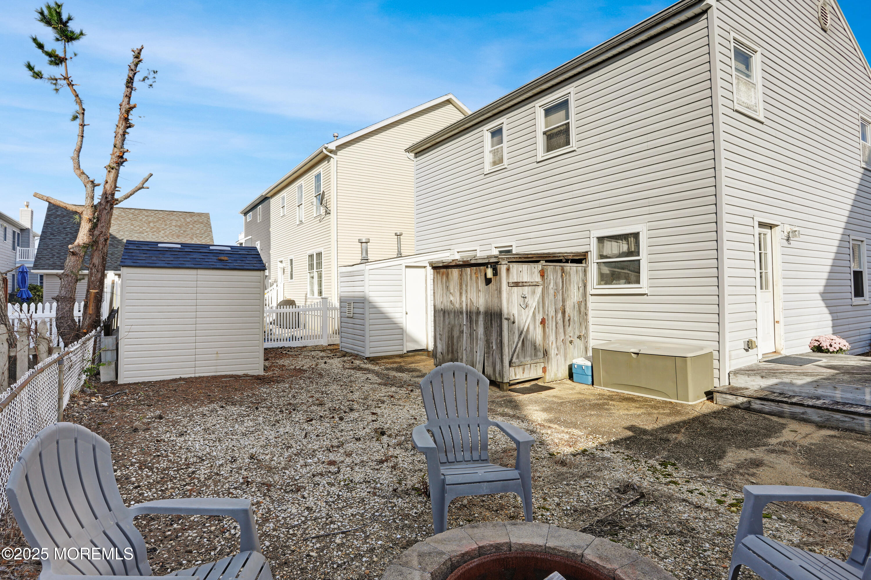 313 Shuster Avenue Seaside Heights, NJ 08751 - Photo 22 of 34 a view of a house with a yard