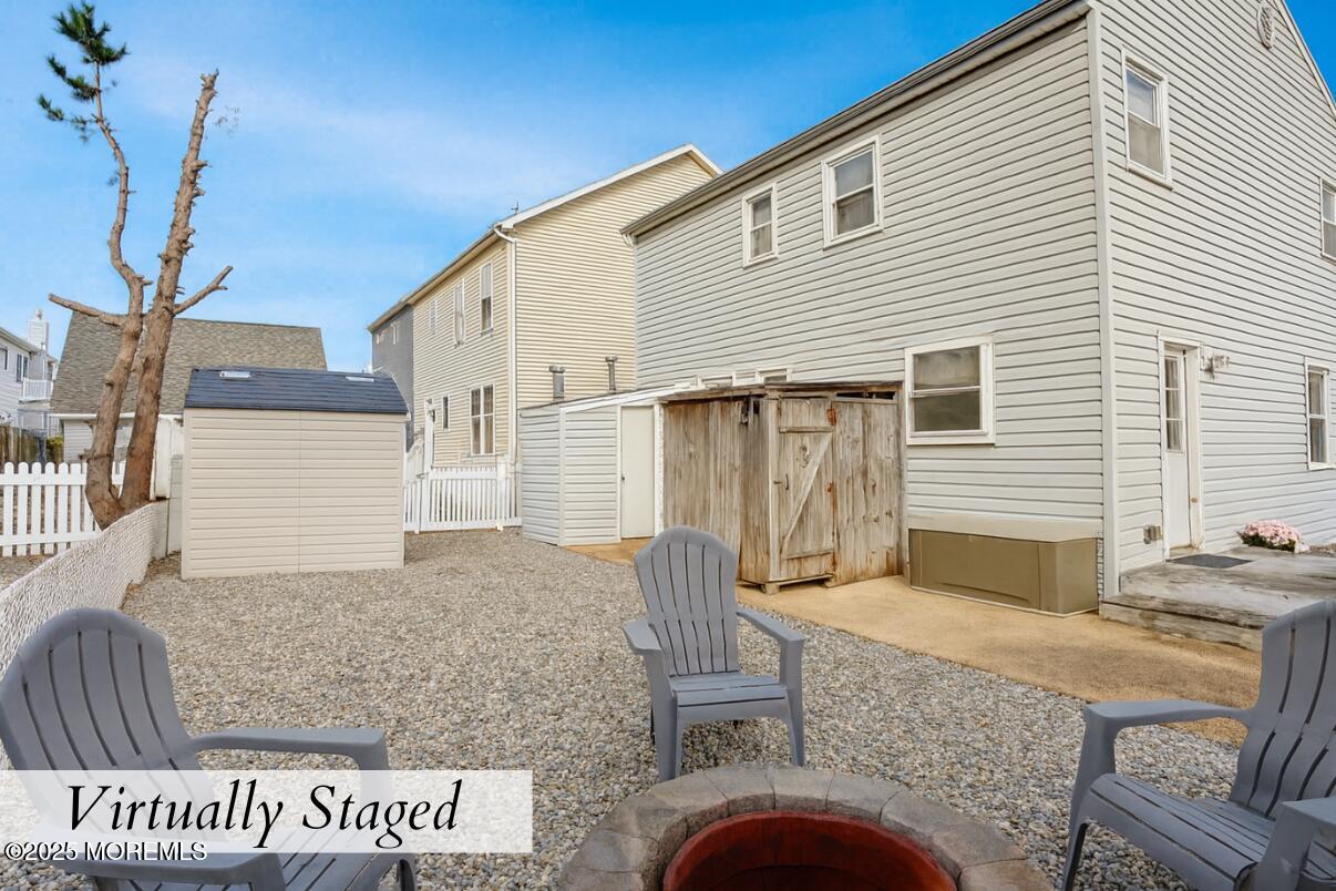 313 Shuster Avenue Seaside Heights, NJ 08751 - Photo 23 of 34 a view of house with patio