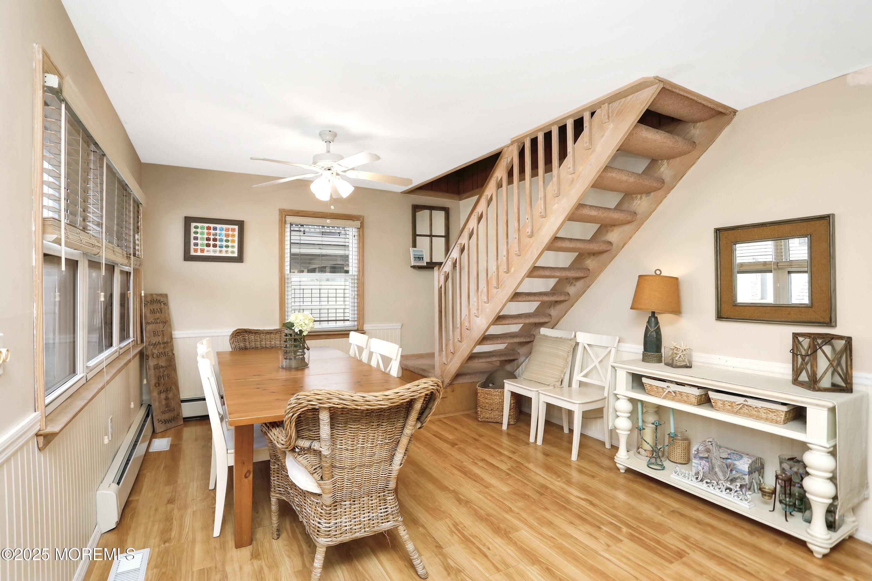 313 Shuster Avenue Seaside Heights, NJ 08751 - Photo 3 of 34 a view of a livingroom with furniture wooden floor and windows