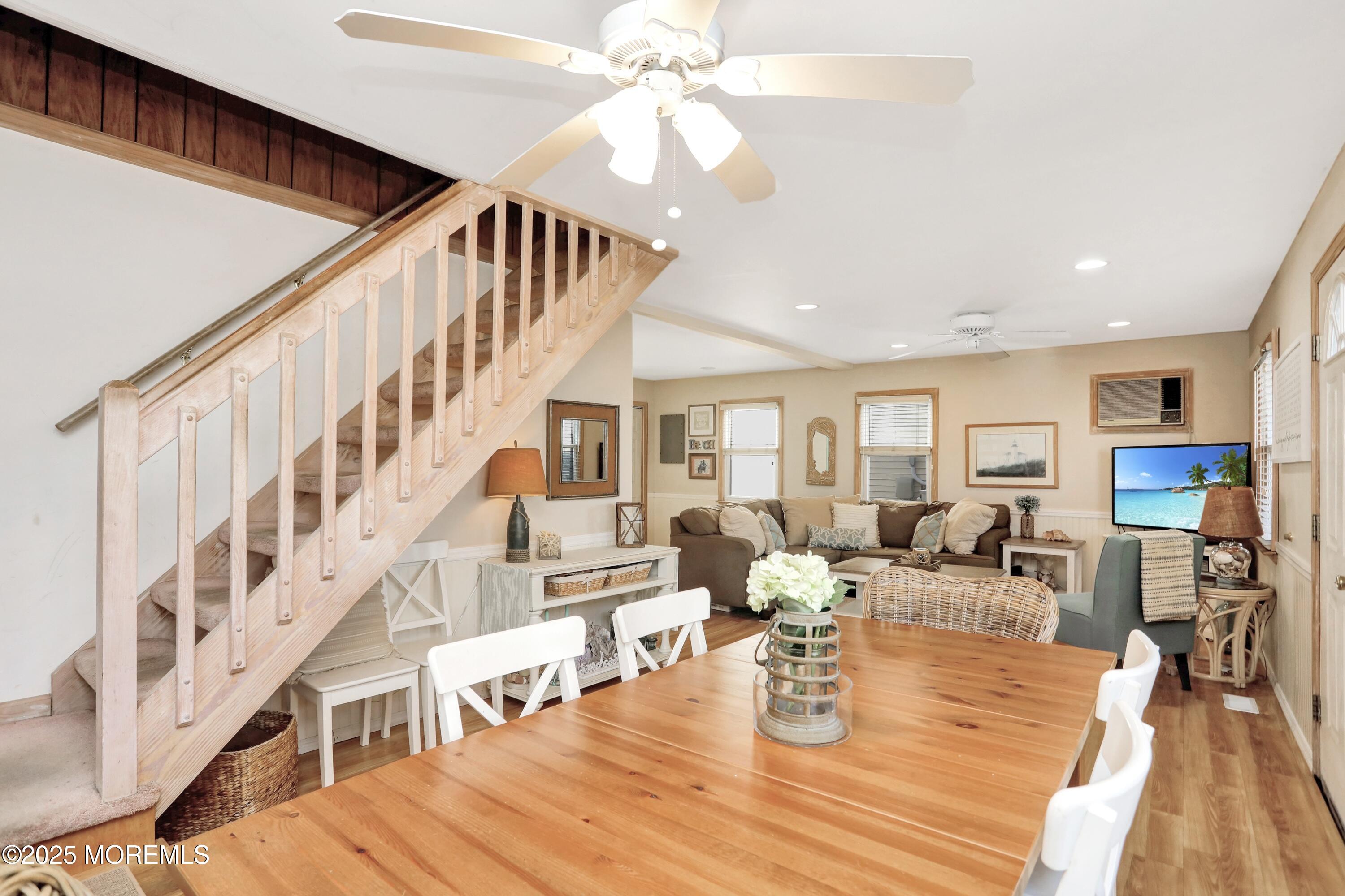 313 Shuster Avenue Seaside Heights, NJ 08751 - Photo 4 of 34 a living room with fireplace furniture and a wooden floor