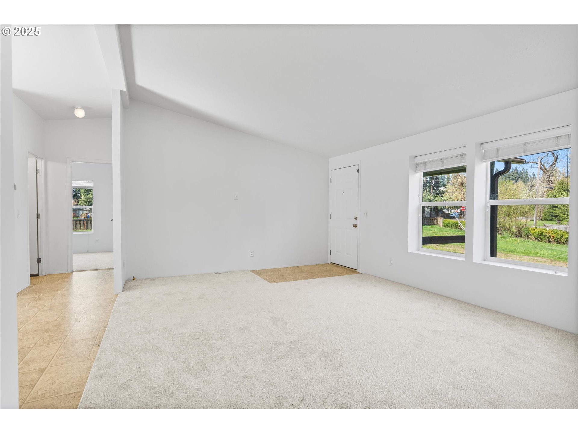 13996 Holcomb Boulevard Oregon City, OR 97045 - Photo 14 of 42 a view of an empty room with a window