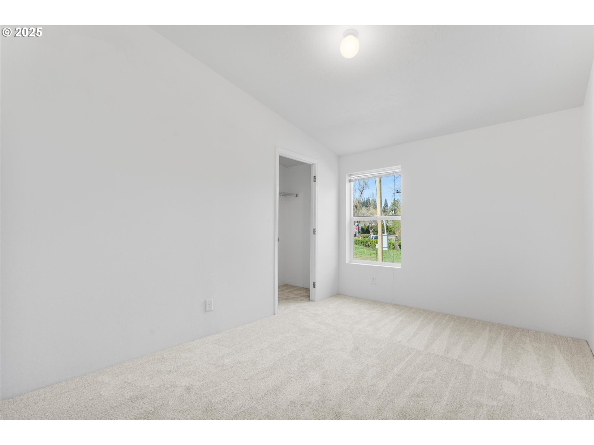 13996 Holcomb Boulevard Oregon City, OR 97045 - Photo 26 of 42 a view of an empty room with a window