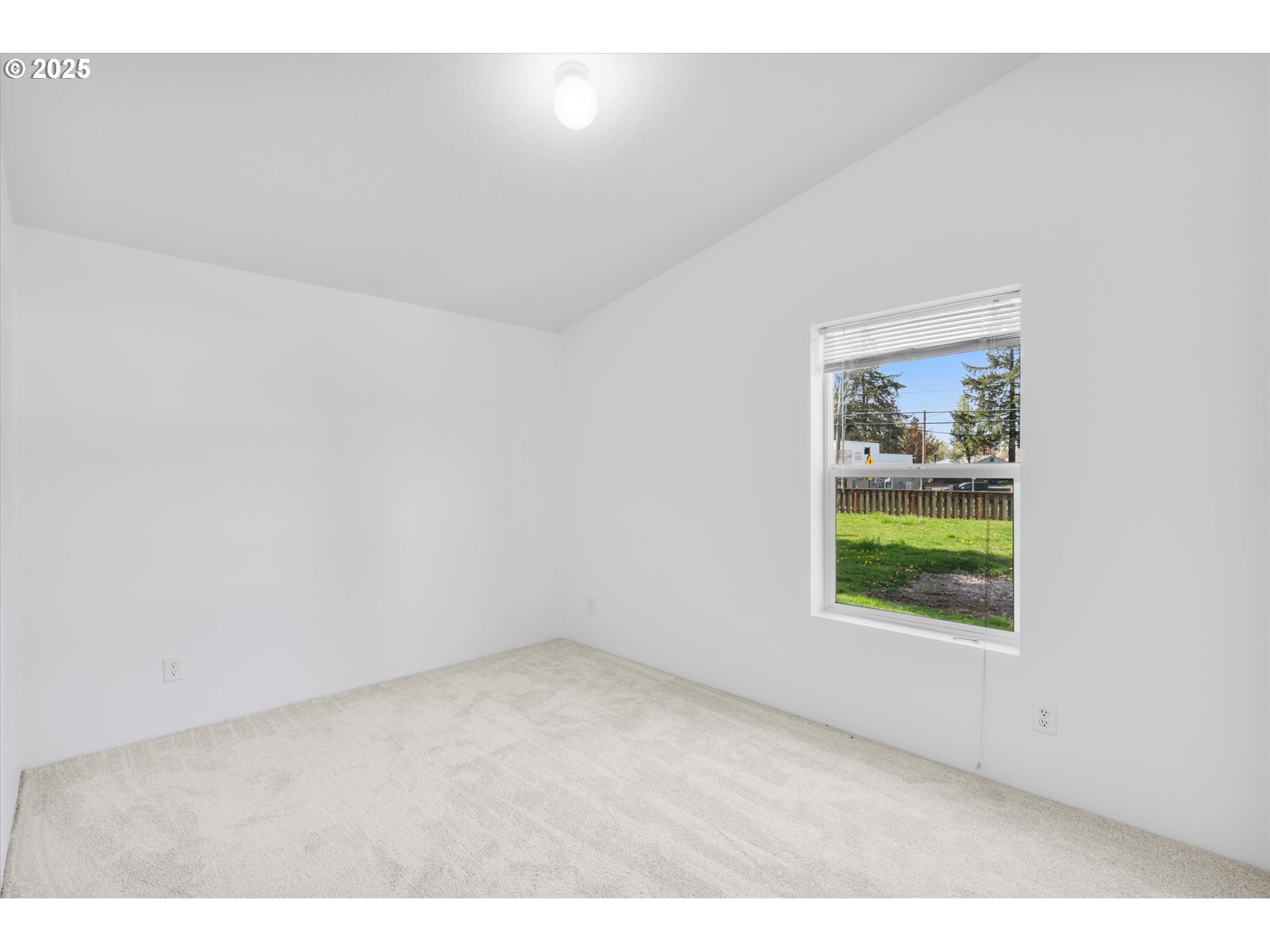 13996 Holcomb Boulevard Oregon City, OR 97045 - Photo 27 of 42 a view of an empty room with a window