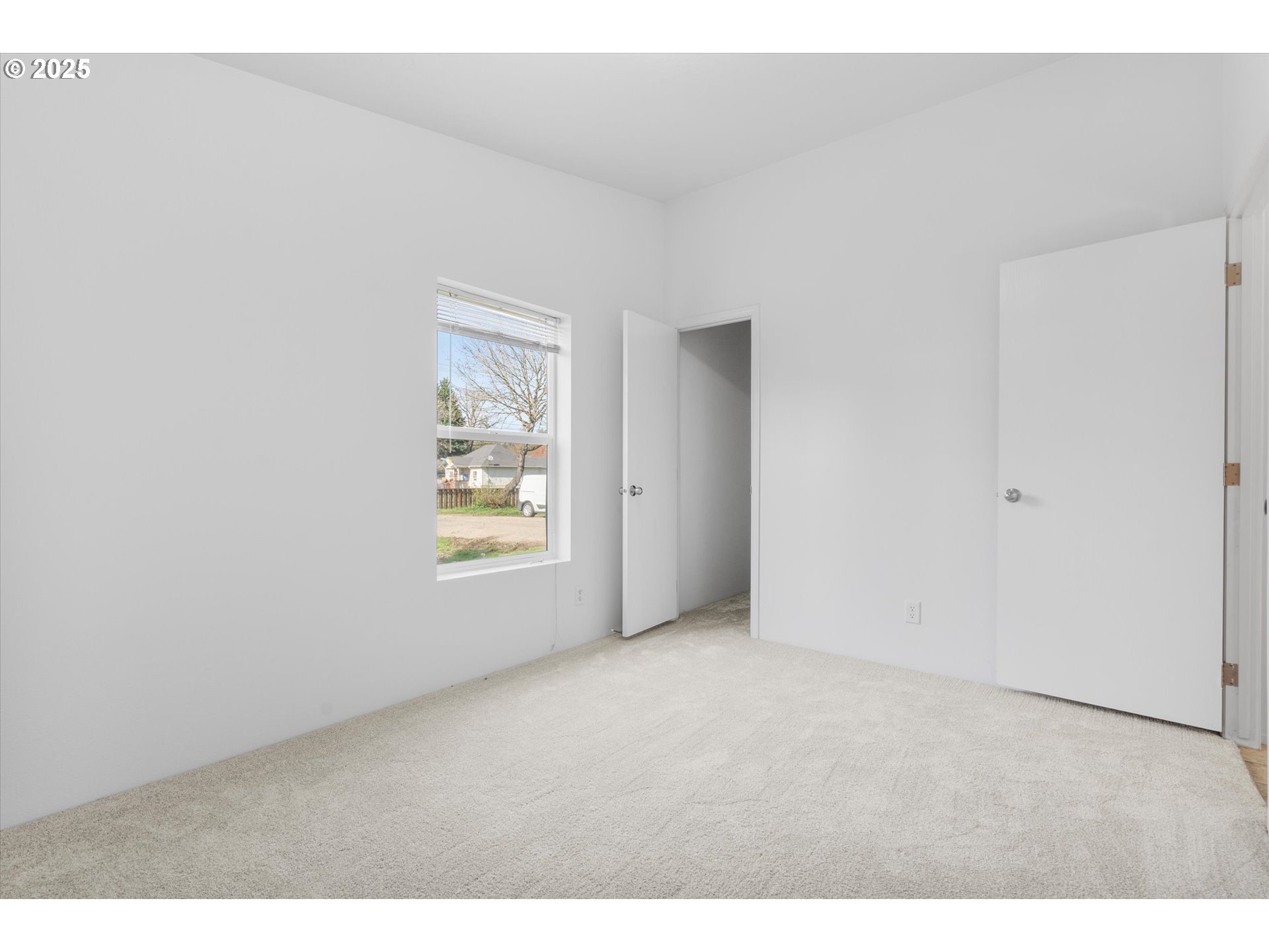 13996 Holcomb Boulevard Oregon City, OR 97045 - Photo 28 of 42 a view of an empty room with a window