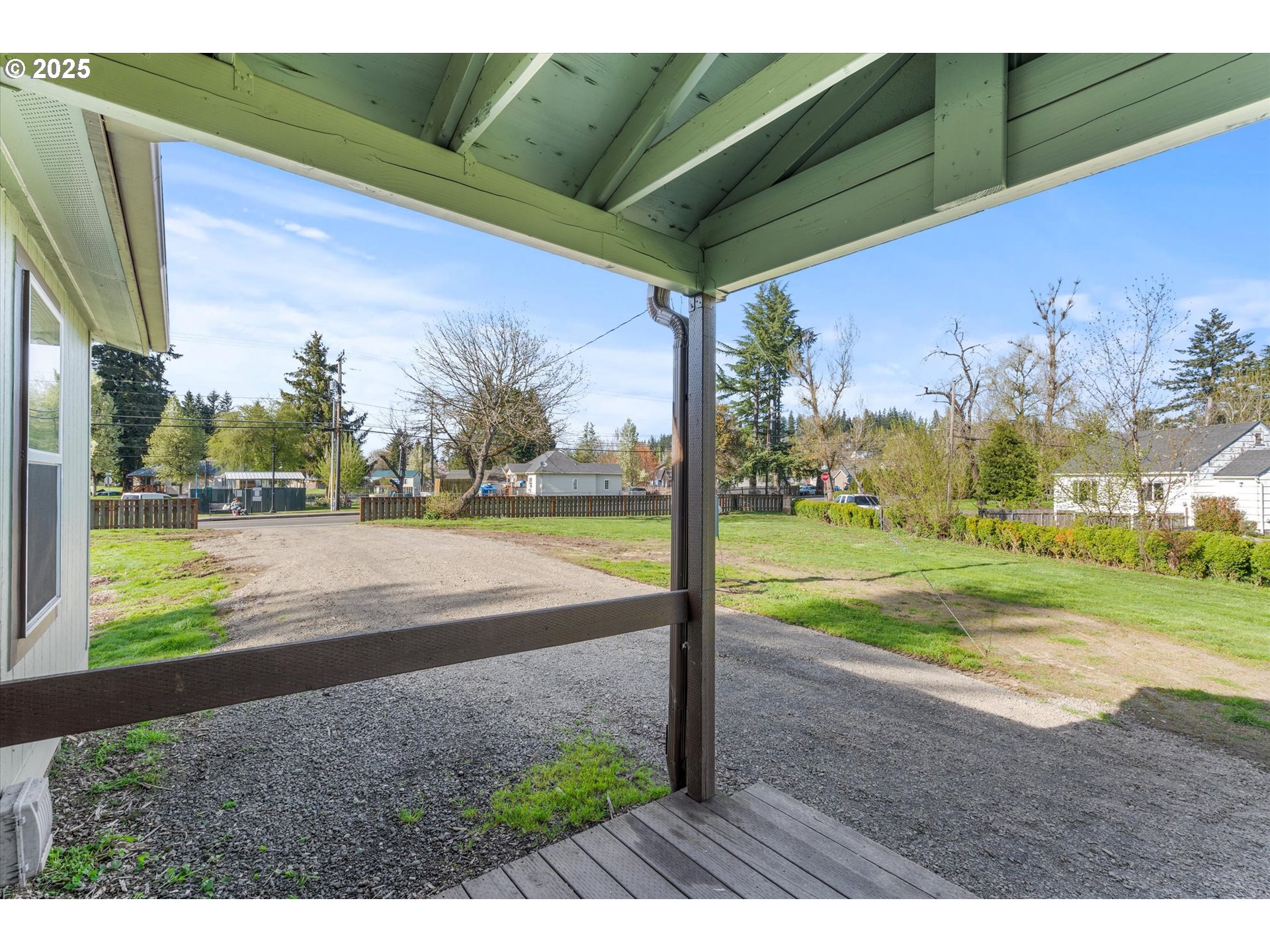 13996 Holcomb Boulevard Oregon City, OR 97045 - Photo 30 of 42 a view of a road with a big yard