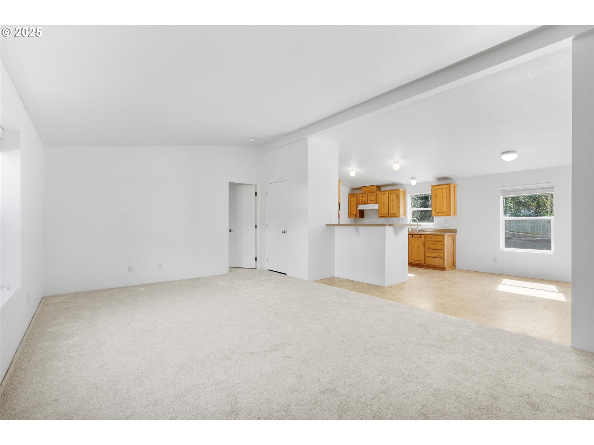 13996 Holcomb Boulevard Oregon City, OR 97045 - Photo 5 of 42 a view of a livingroom with wooden furniture
