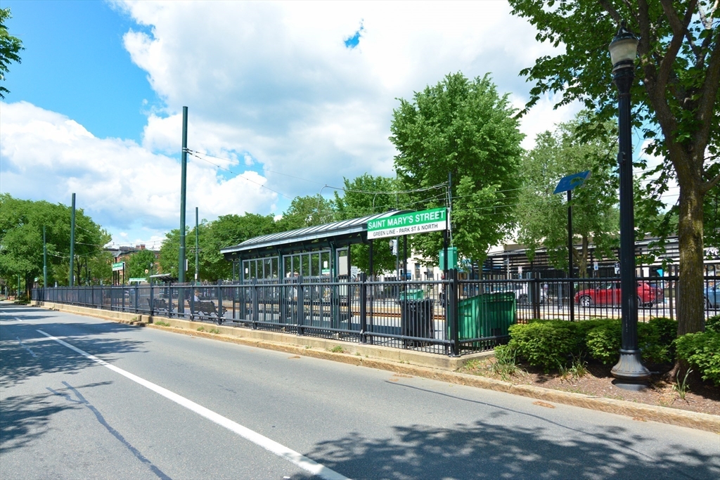 923 Beacon Street, Unit 2 Boston, MA 02215 - Photo 11 of 11 a view of a building with a garden