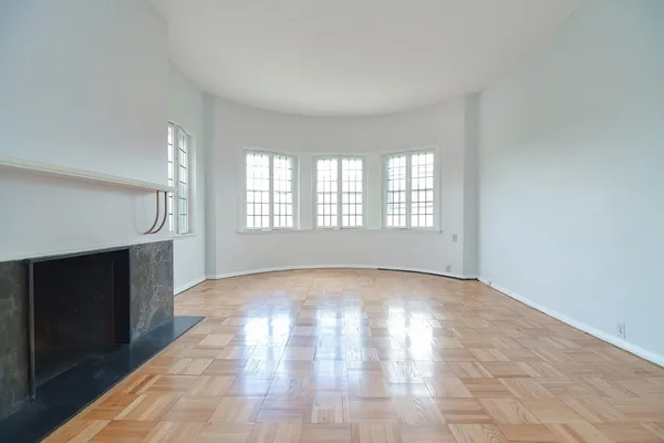 an empty room with windows