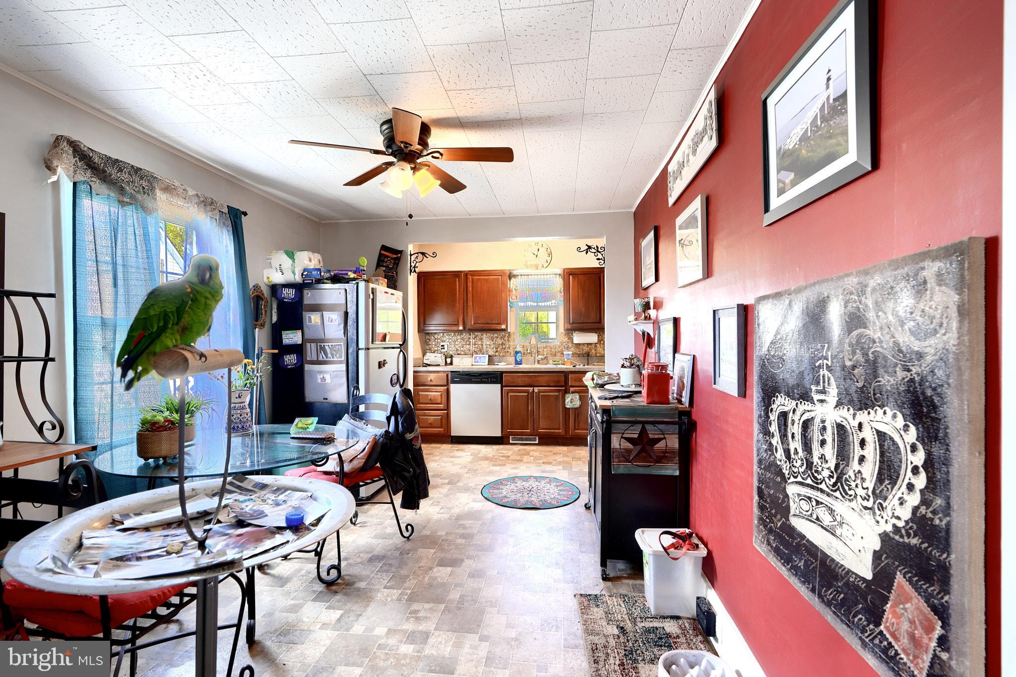 10816 Red Lion Road White Marsh, MD 21162 - Photo 12 of 39 a living room with furniture and flat screen tv