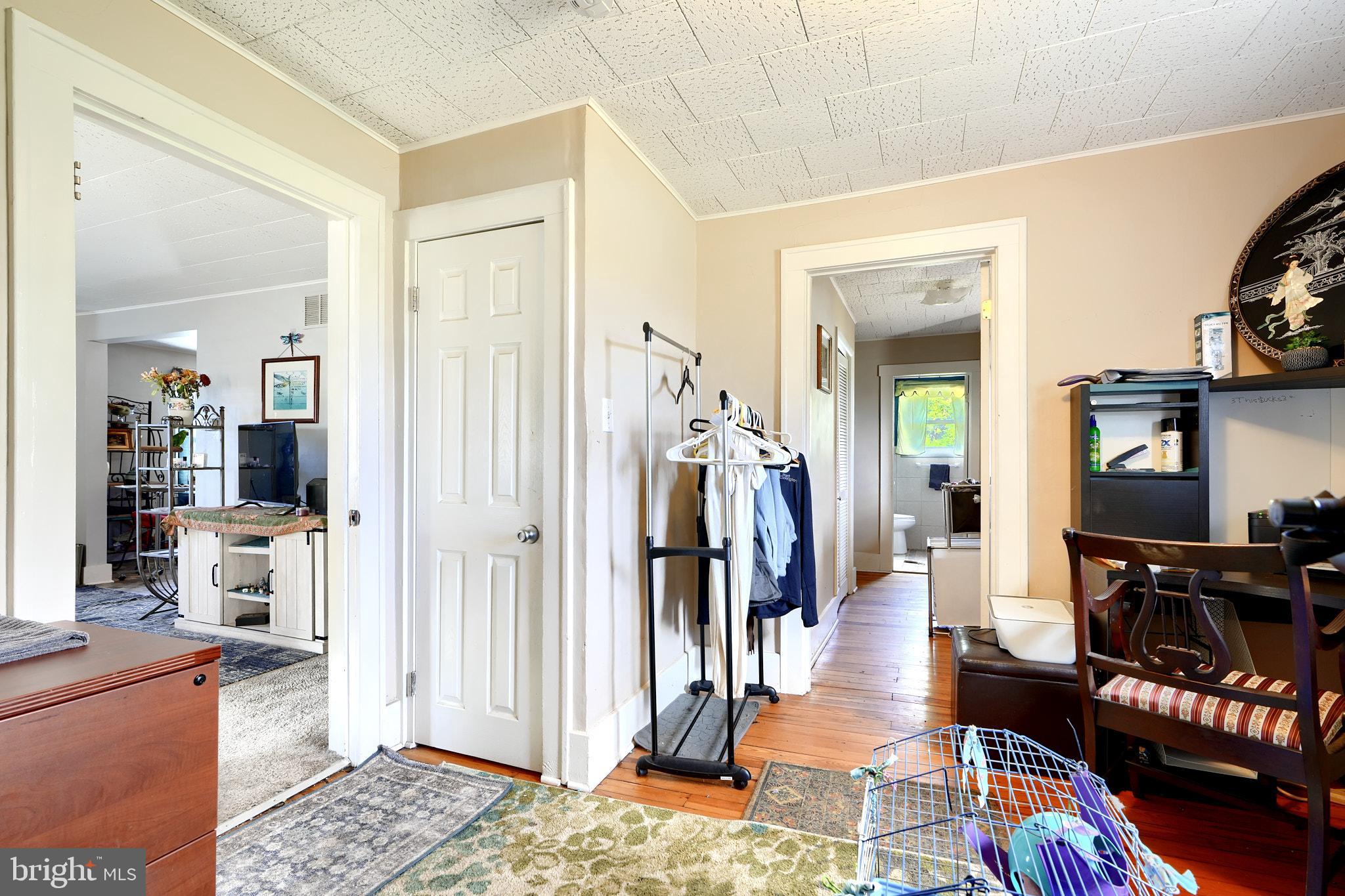 10816 Red Lion Road White Marsh, MD 21162 - Photo 19 of 39 a living room with furniture and a wooden floor