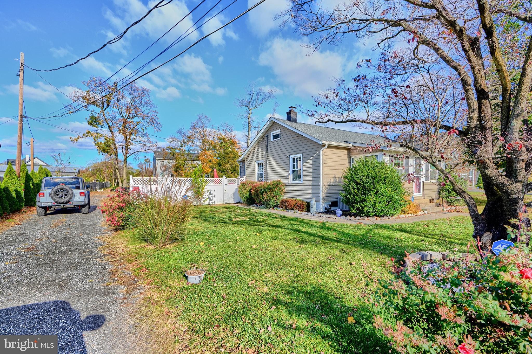 10816 Red Lion Road White Marsh, MD 21162 - Photo 2 of 39 a view of a back yard of the house