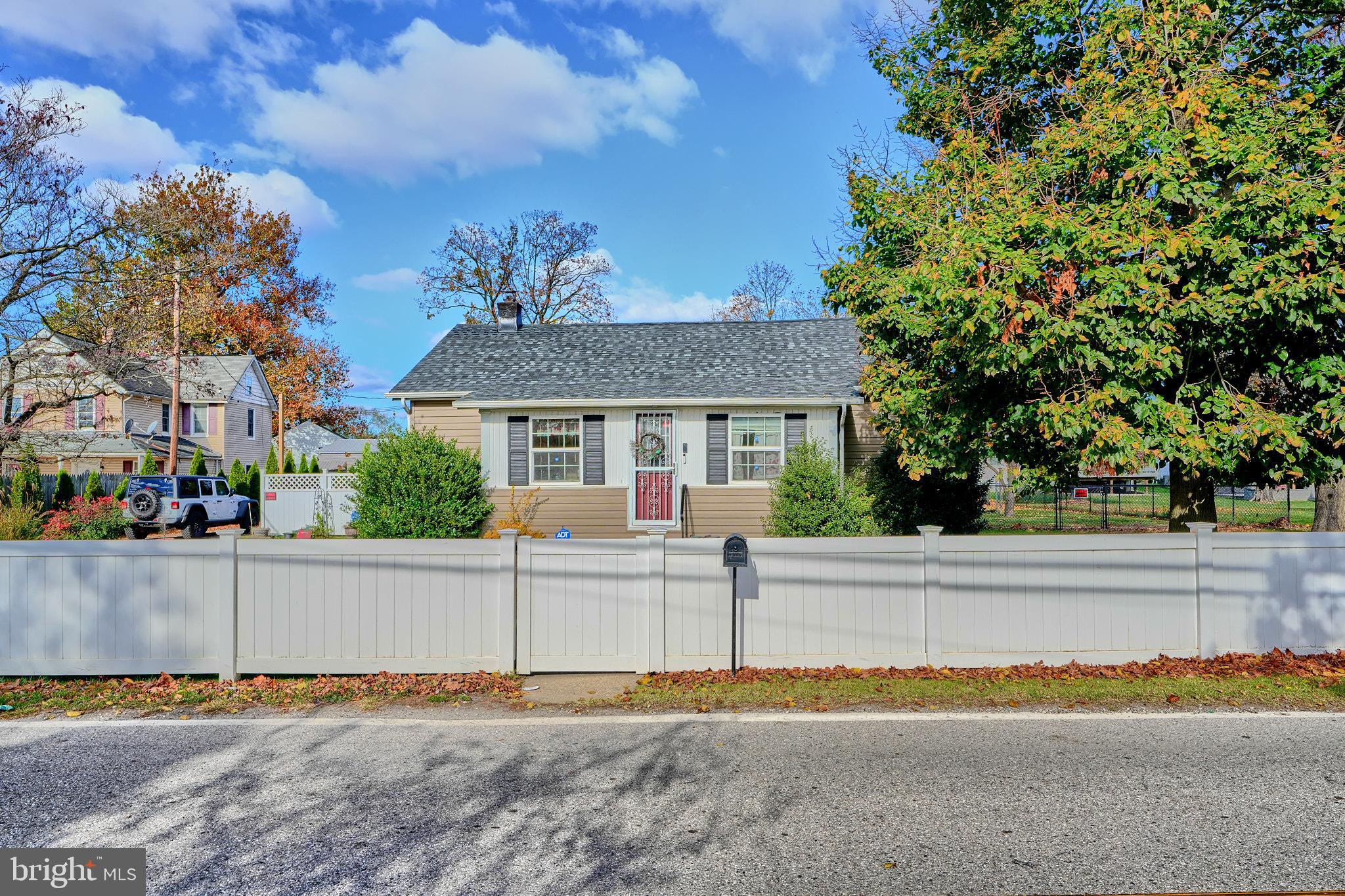 10816 Red Lion Road White Marsh, MD 21162 - Photo 4 of 39 front view of a house with a street