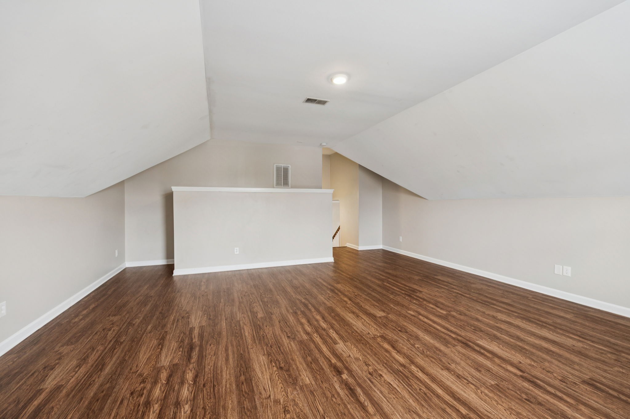 1305 Chapman Court Spring Hill, TN 37174 - Photo 28 of 53 a view of an empty room with wooden floor and a window