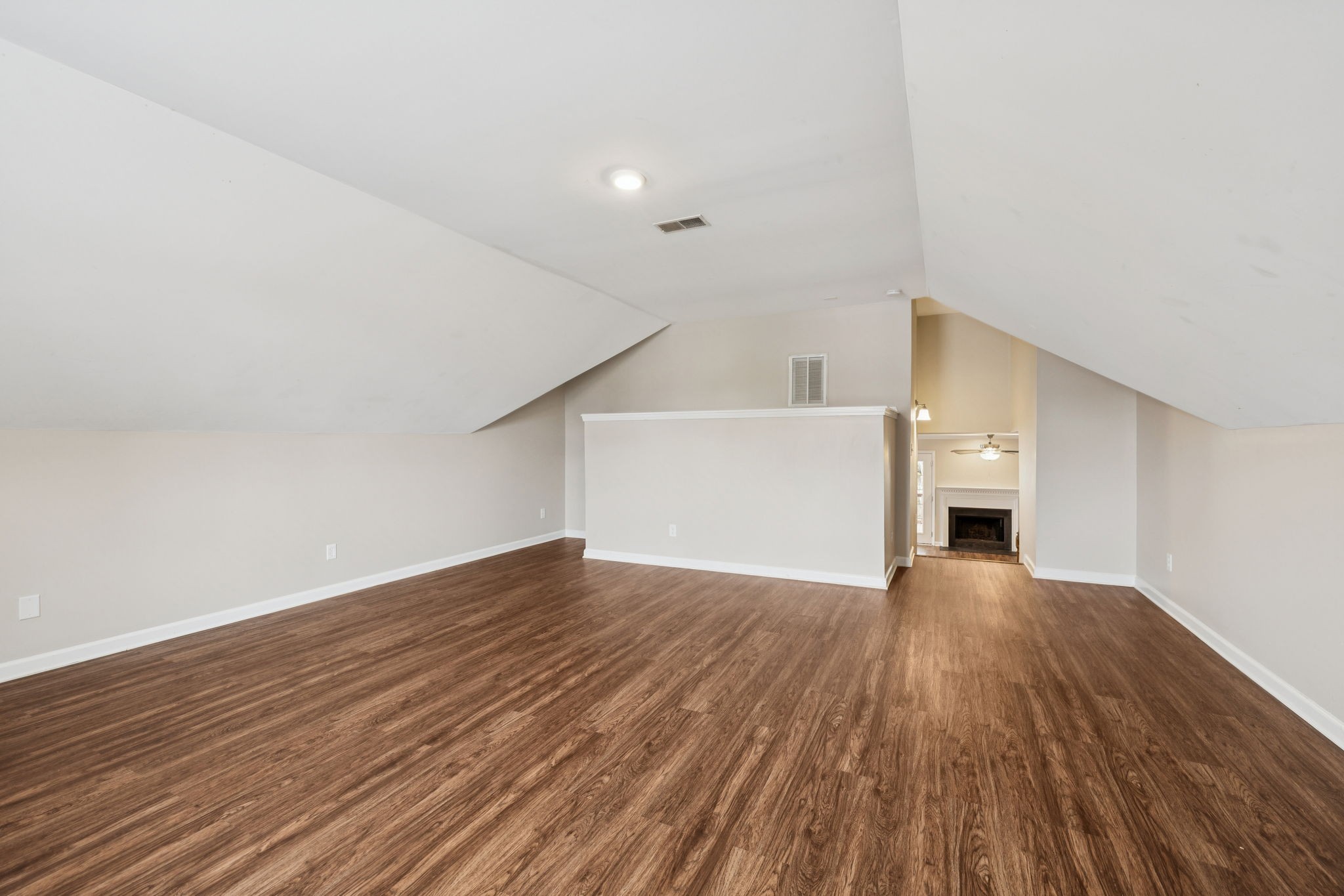 1305 Chapman Court Spring Hill, TN 37174 - Photo 29 of 53 a view of a livingroom with wooden floor and staircase