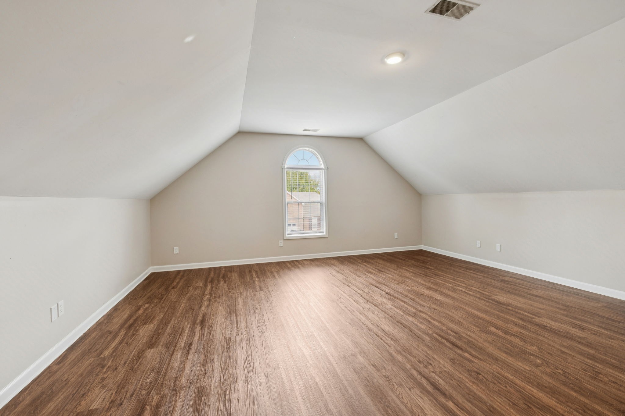 1305 Chapman Court Spring Hill, TN 37174 - Photo 30 of 53 an empty room with wooden floor and windows