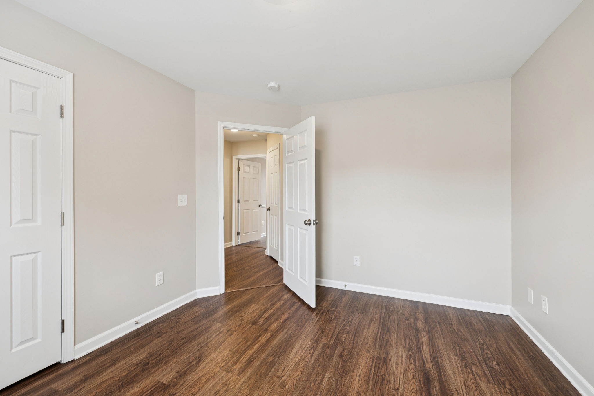 1305 Chapman Court Spring Hill, TN 37174 - Photo 36 of 53 a view of a hallway with wooden floor