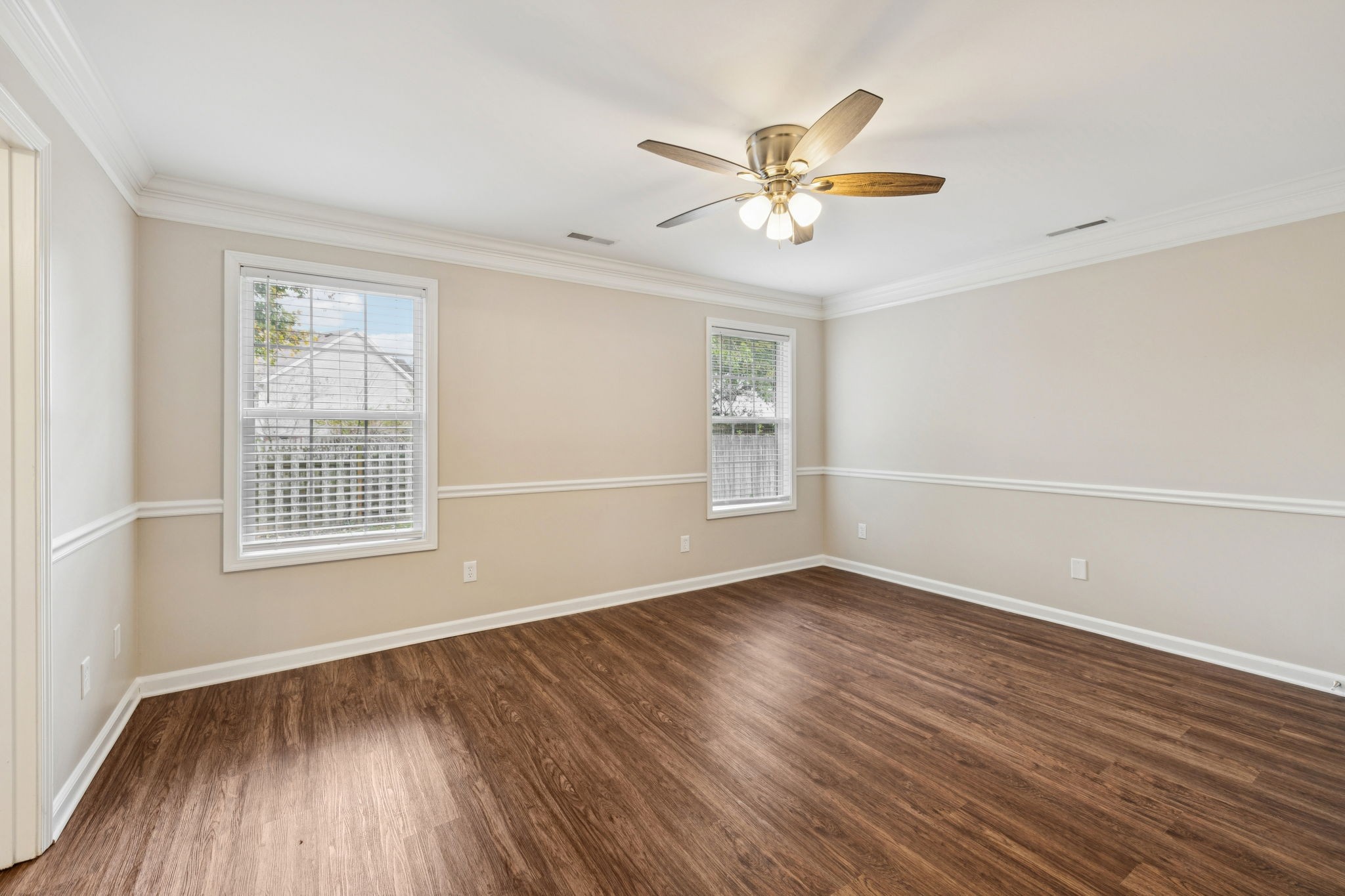 1305 Chapman Court Spring Hill, TN 37174 - Photo 37 of 53 a view of an empty room with wooden floor and a window