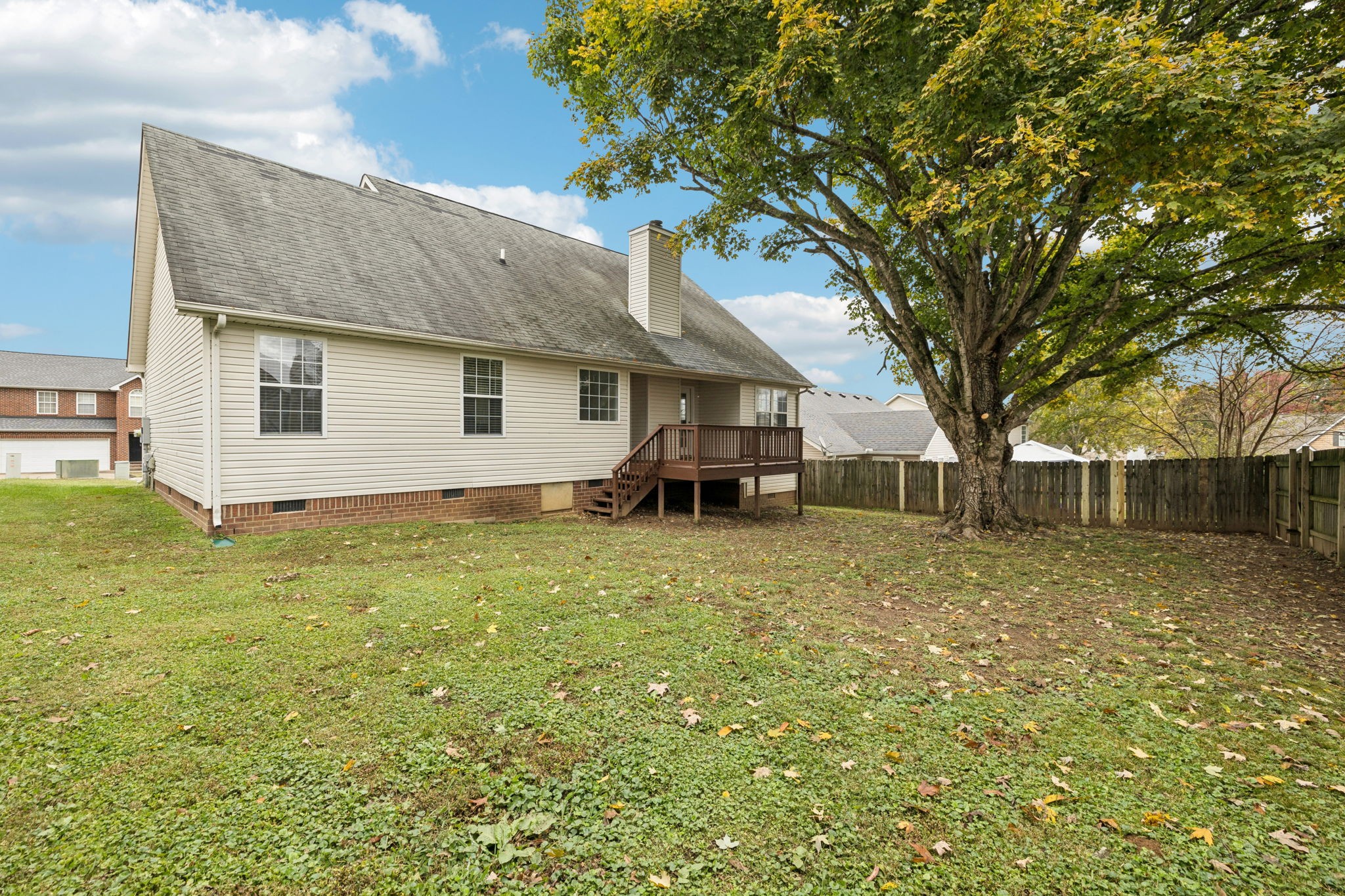 1305 Chapman Court Spring Hill, TN 37174 - Photo 48 of 53 a front view of house with yard and trees