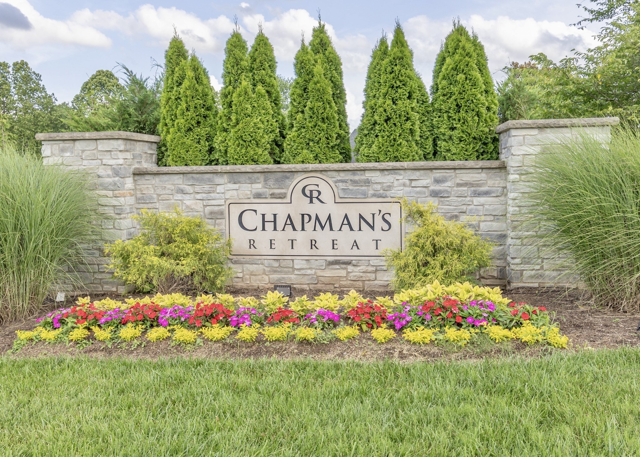 1305 Chapman Court Spring Hill, TN 37174 - Photo 51 of 53 a view of front door with house and flowers around
