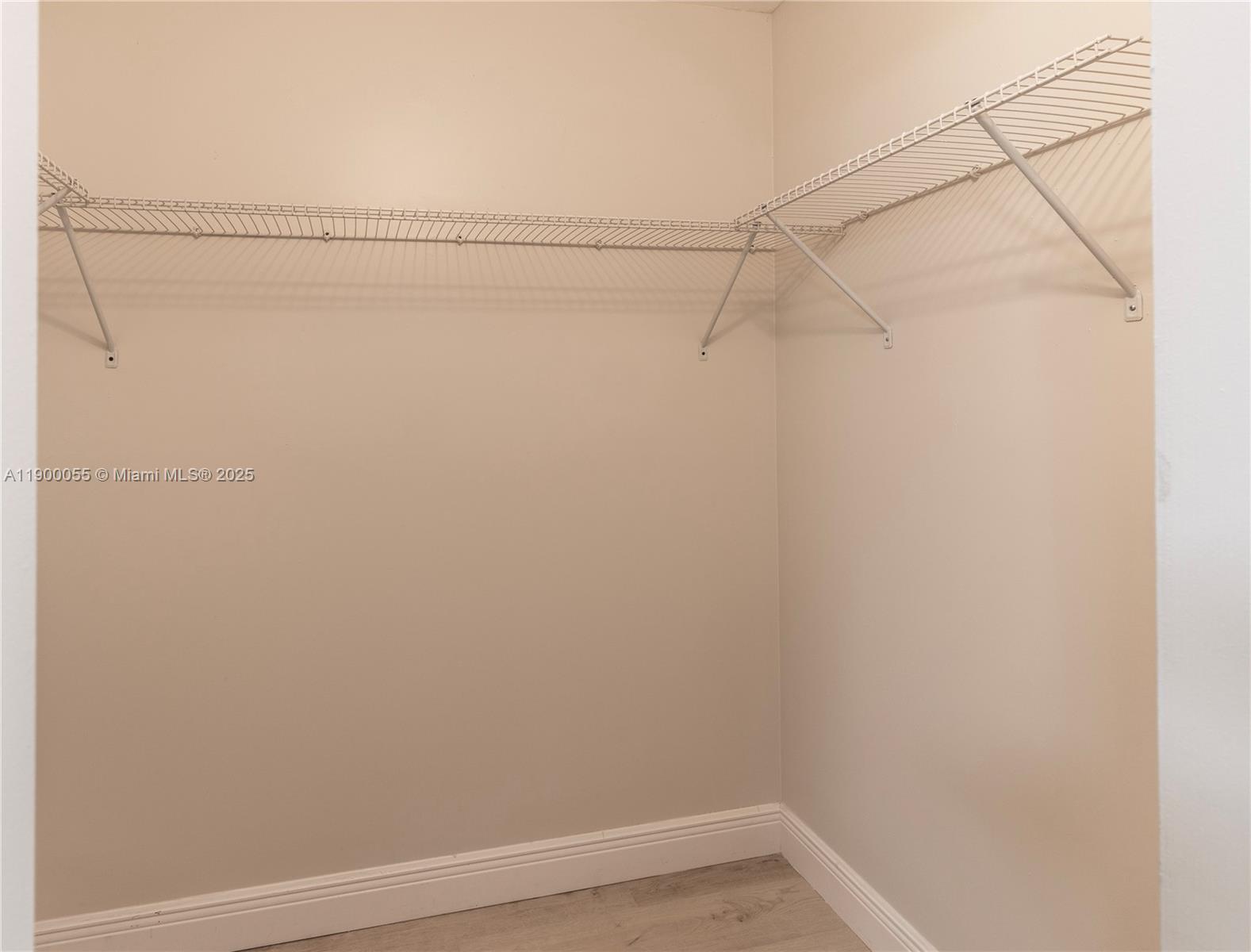 14237 Southwest 94th Cir Lane, Unit 101 Miami, FL 33186 - Photo 16 of 34 a view of small space with racks on the wall