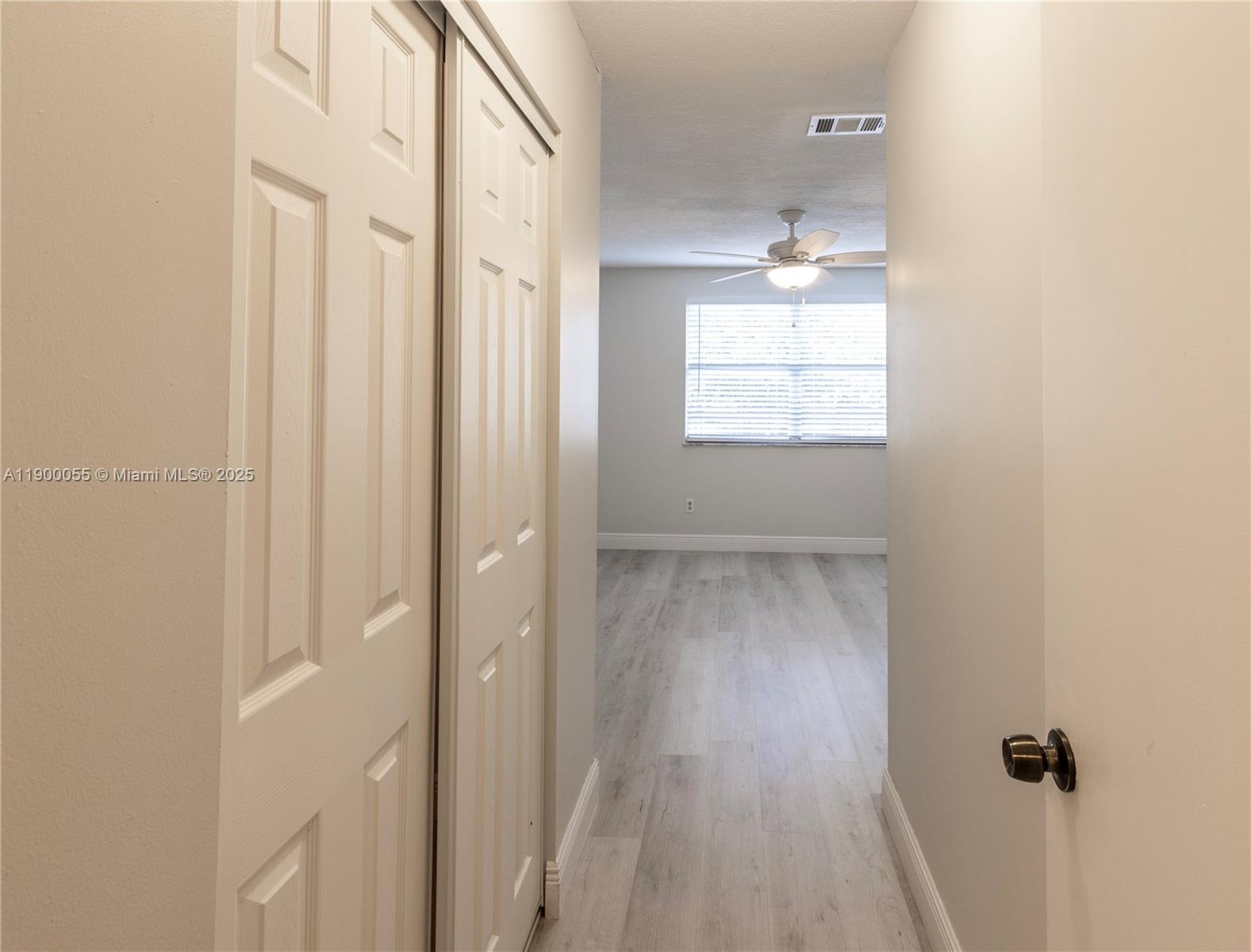 14237 Southwest 94th Cir Lane, Unit 101 Miami, FL 33186 - Photo 23 of 34 a bathroom with a window