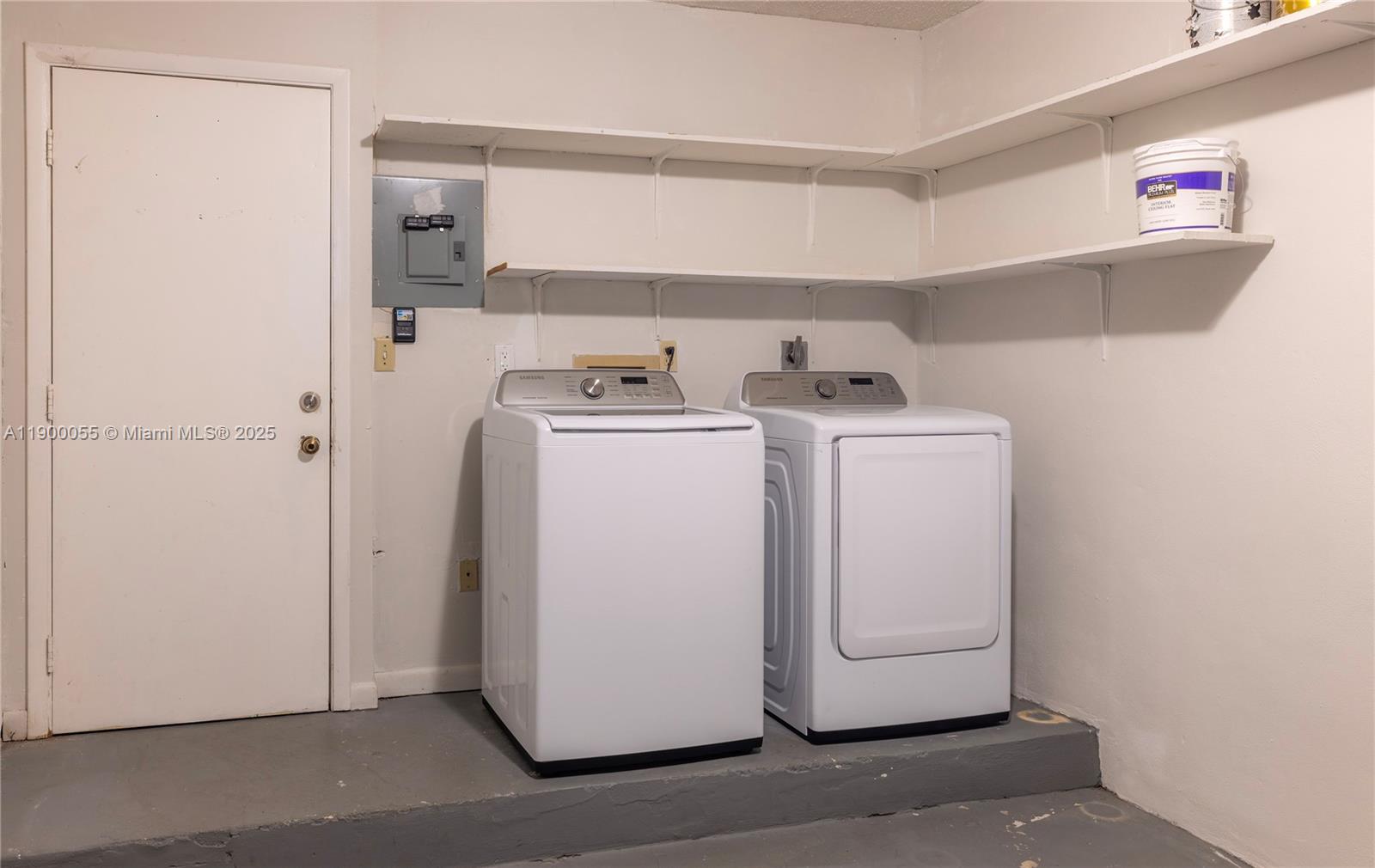 14237 Southwest 94th Cir Lane, Unit 101 Miami, FL 33186 - Photo 5 of 34 a utility room with dryer and washer