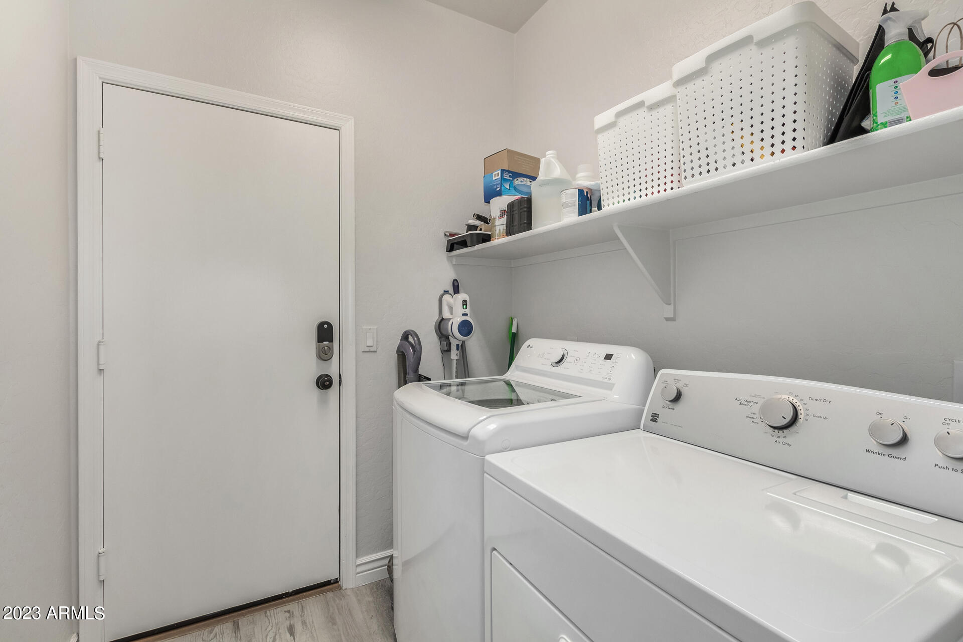 17560 West E Wind Avenue Goodyear, AZ 85338 - Photo 19 of 30 a utility room with dryer and washer