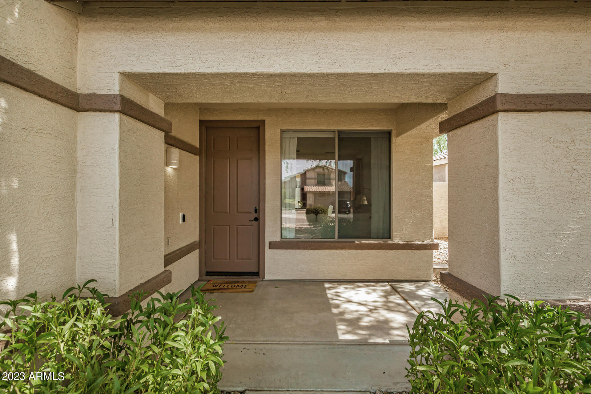 17560 West E Wind Avenue Goodyear, AZ 85338 - Photo 2 of 30 a front view of a house