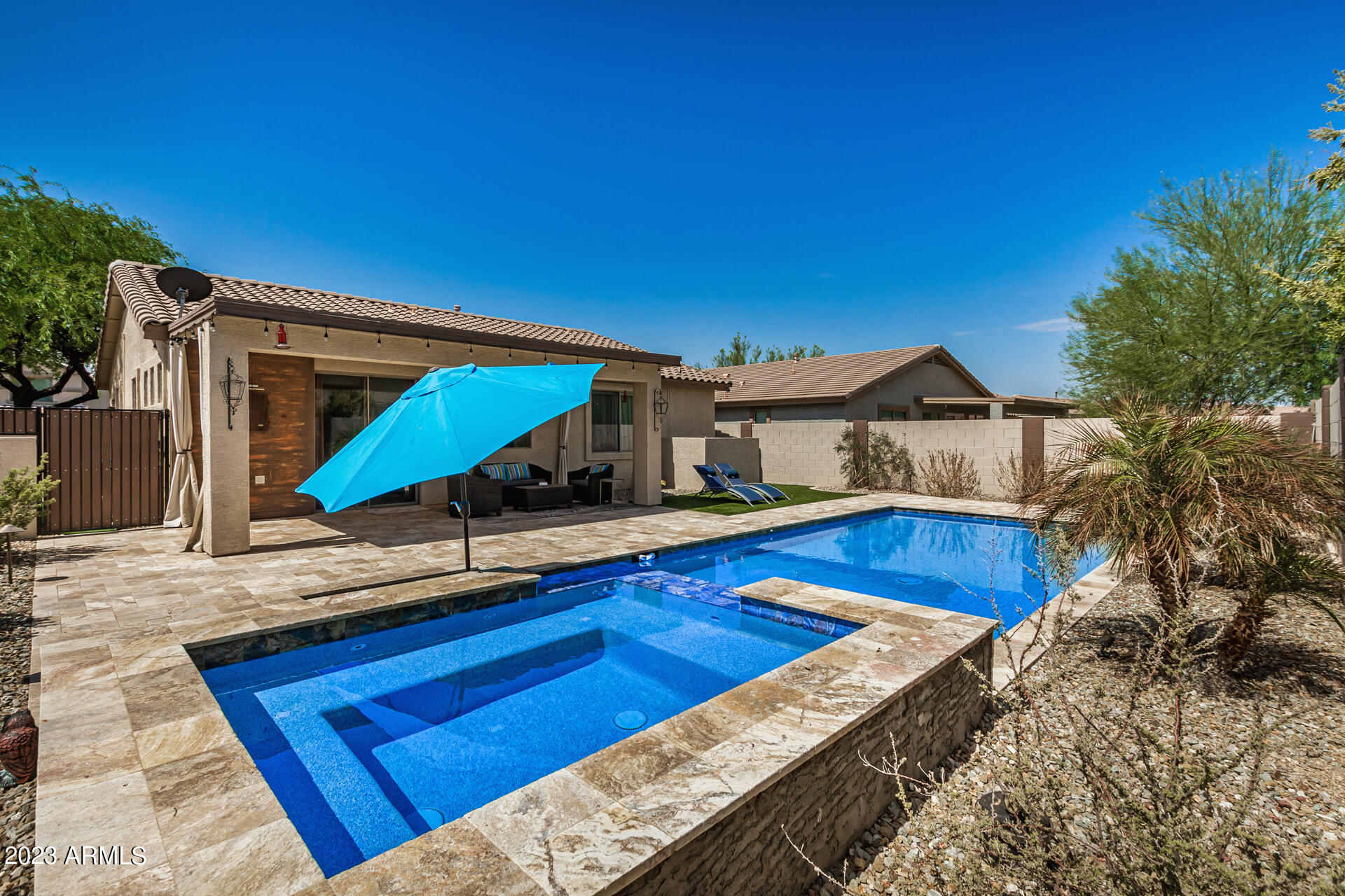 17560 West E Wind Avenue Goodyear, AZ 85338 - Photo 25 of 30 a view of a house with swimming pool