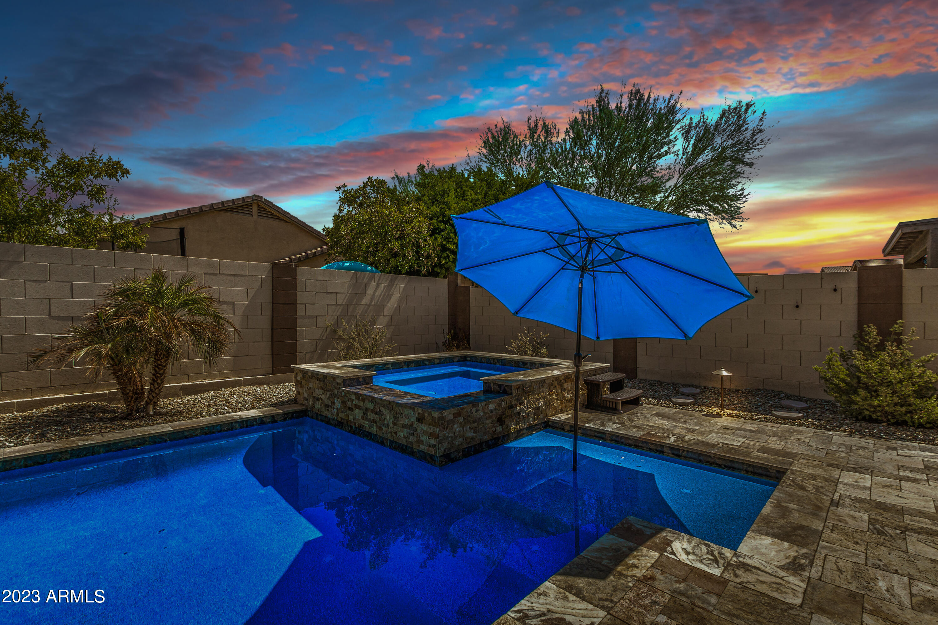 17560 West E Wind Avenue Goodyear, AZ 85338 - Photo 27 of 30 a view of a backyard with sitting area