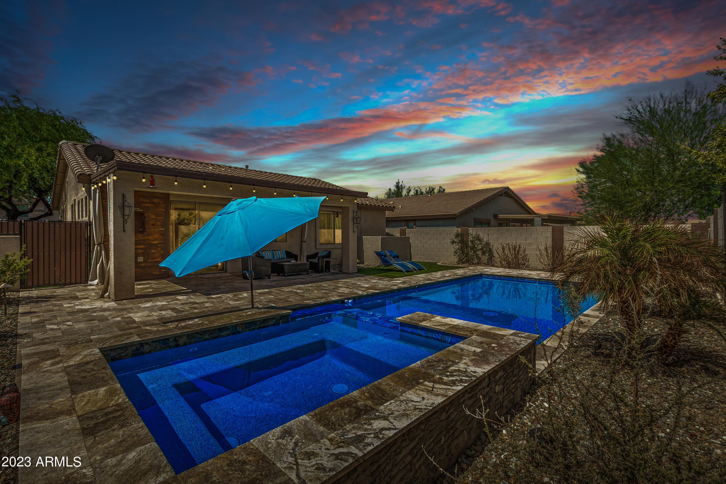 17560 West E Wind Avenue Goodyear, AZ 85338 - Photo 28 of 30 a view of a mini pool with an outdoor seating