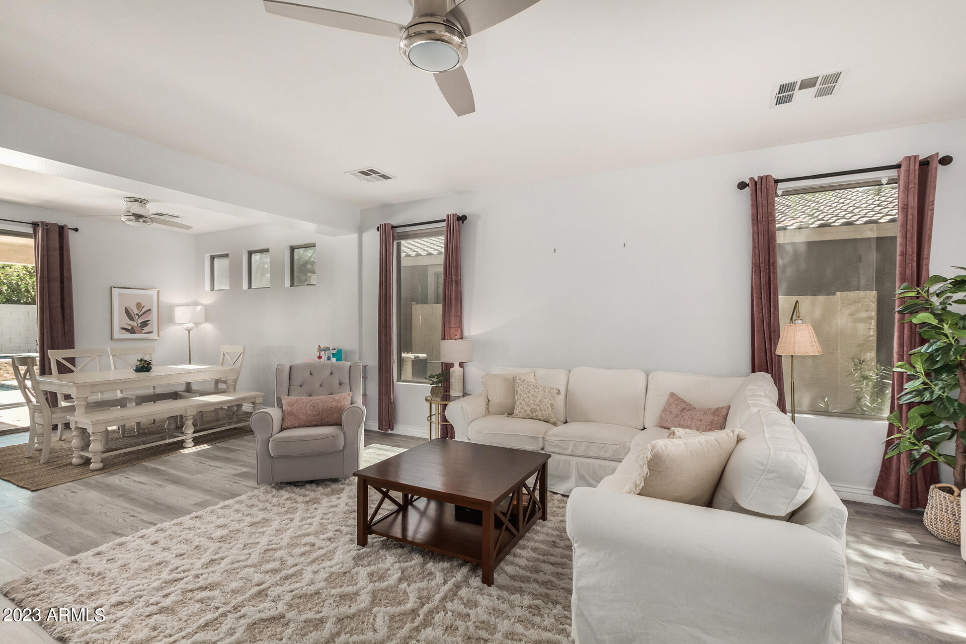 17560 West E Wind Avenue Goodyear, AZ 85338 - Photo 4 of 30 a living room with furniture and view of living room