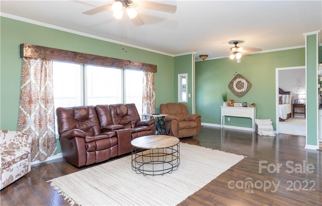 4016 Hoodtown Road Sharon, SC 29742 - Photo 22 of 32 a living room with furniture and a large window