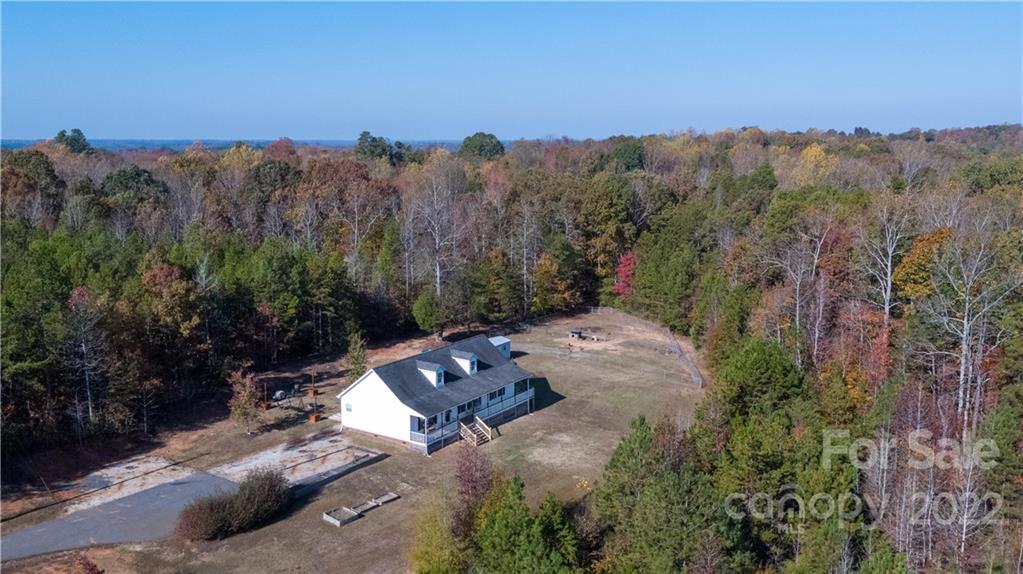 4016 Hoodtown Road Sharon, SC 29742 - Photo 26 of 32 an aerial view of a forest with mountain view