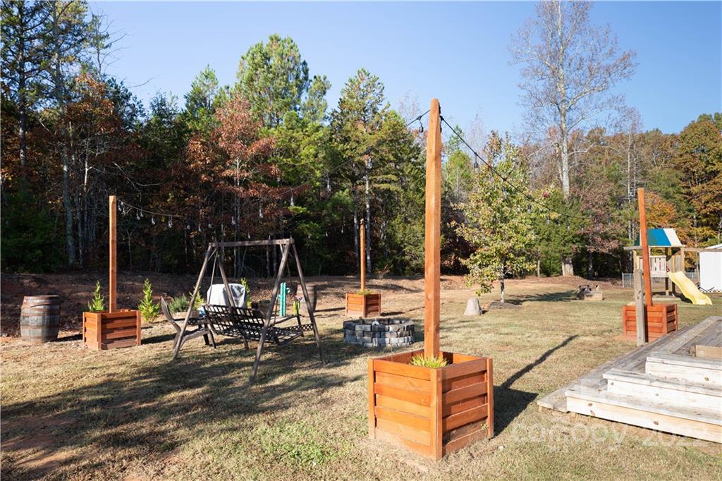 4016 Hoodtown Road Sharon, SC 29742 - Photo 5 of 32 a view of a park with swings on the side of the road