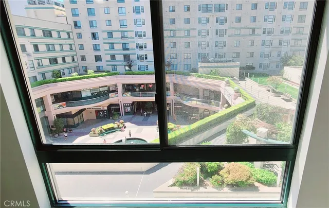 a view of swimming pool from a window