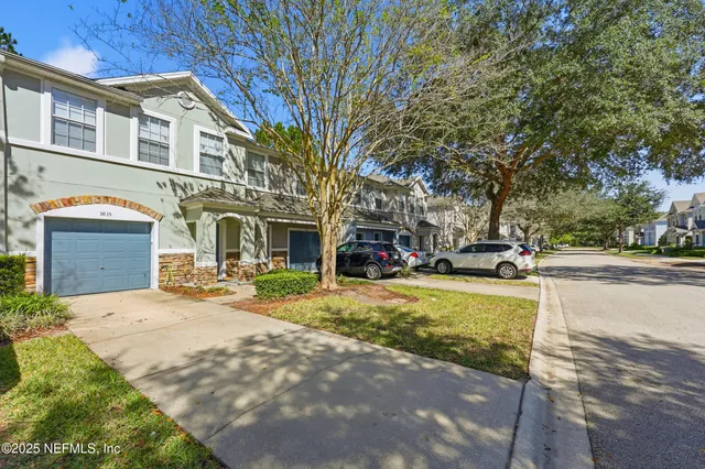 a front view of a building with street view