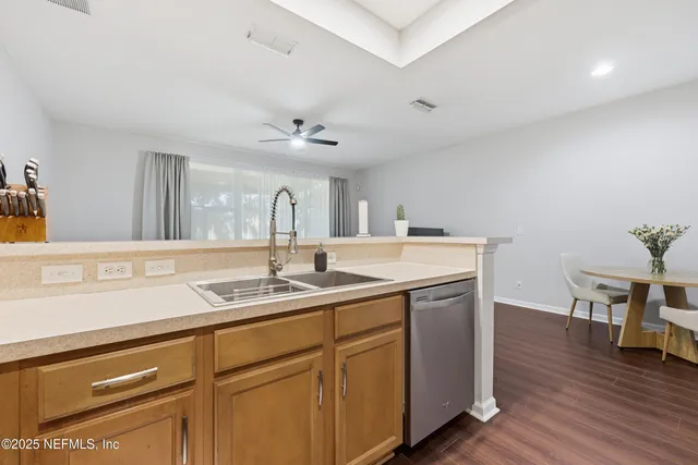 a view with a sink and a mirror