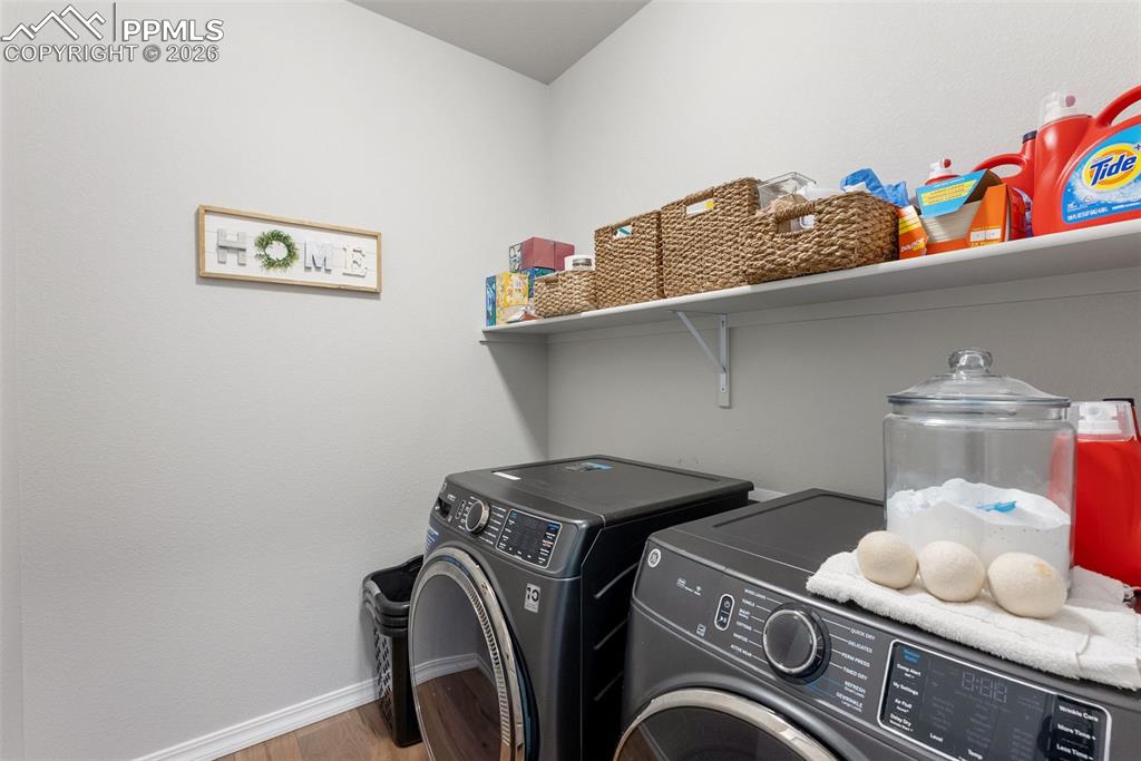 10484 Wrangell Circle Colorado Springs, CO 80924 - Photo 18 of 50 a utility room with dryer and washer