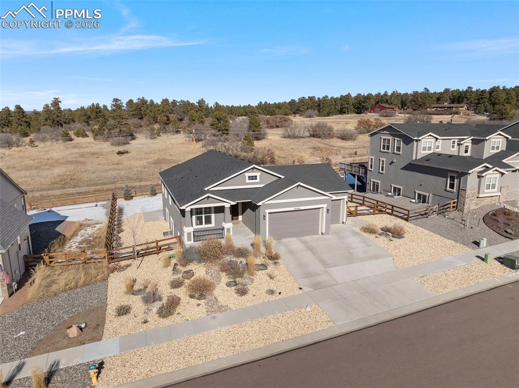 10484 Wrangell Circle Colorado Springs, CO 80924 - Photo 45 of 50 an aerial view of a house with a yard and balcony