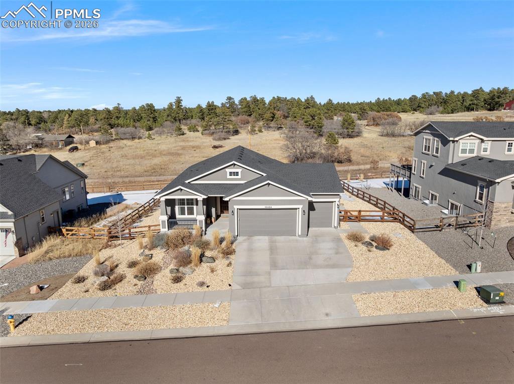 10484 Wrangell Circle Colorado Springs, CO 80924 - Photo 46 of 50 an aerial view of a house with a mountain view