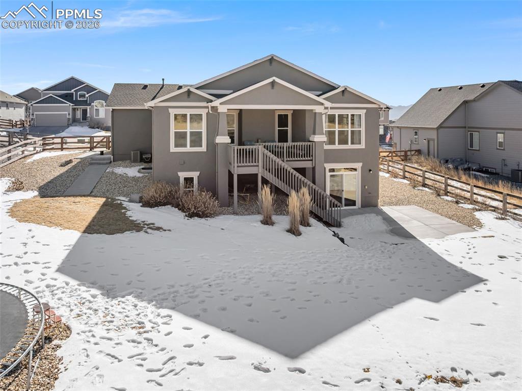 10484 Wrangell Circle Colorado Springs, CO 80924 - Photo 49 of 50 a front view of a house with a yard