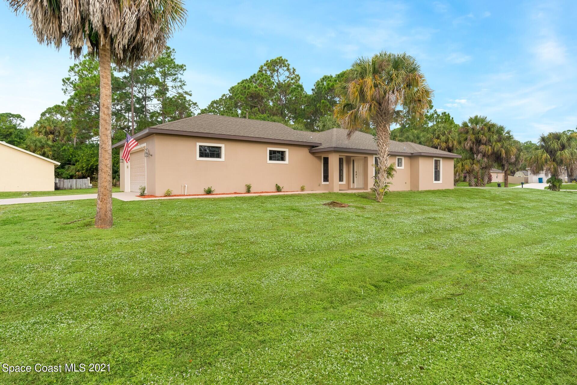 1320 Gibbs Road Southwest Palm Bay, FL 32908 - Photo 3 of 42 Side View Left