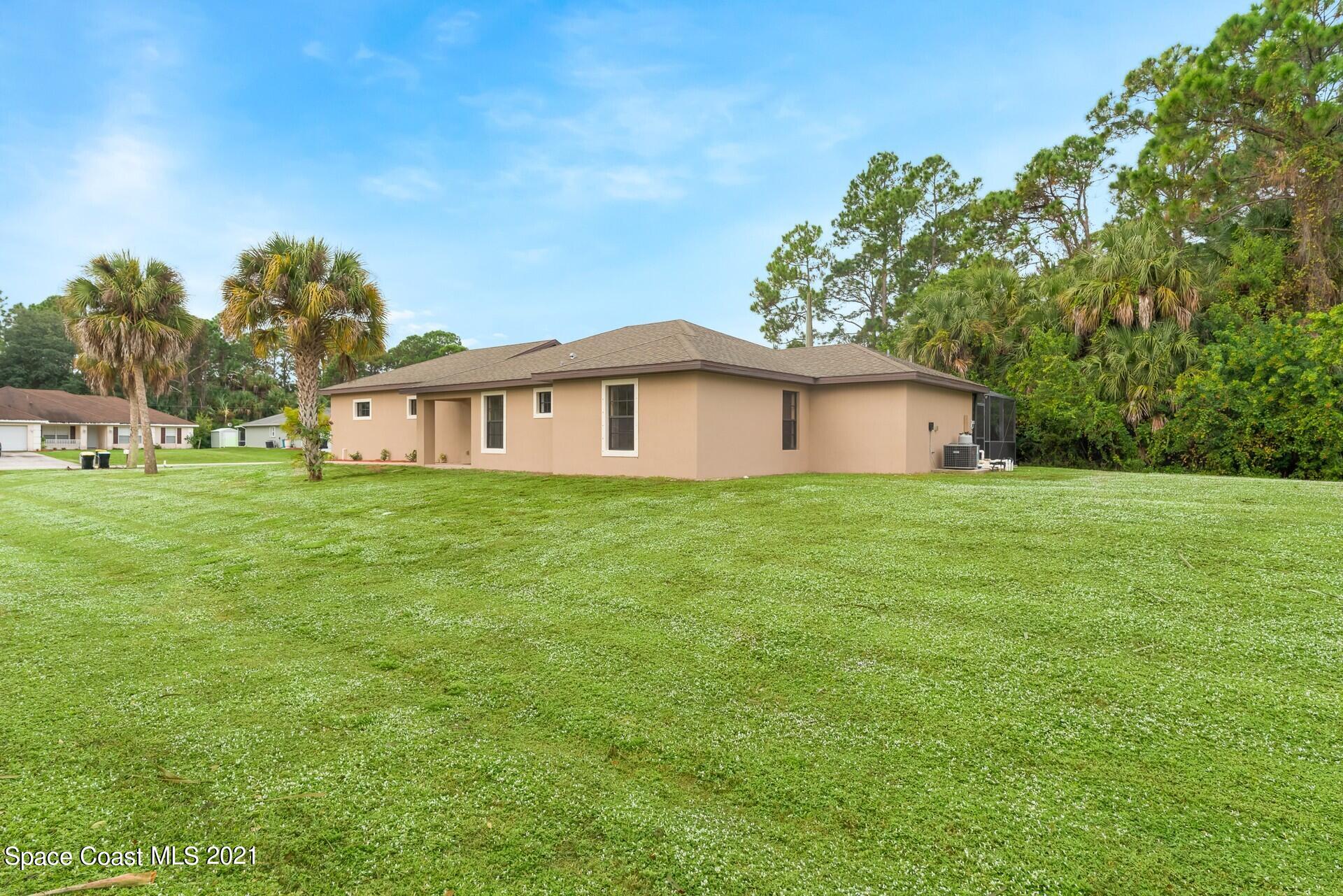1320 Gibbs Road Southwest Palm Bay, FL 32908 - Photo 8 of 42 Side View Right