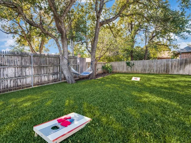 a view of a house with a big yard
