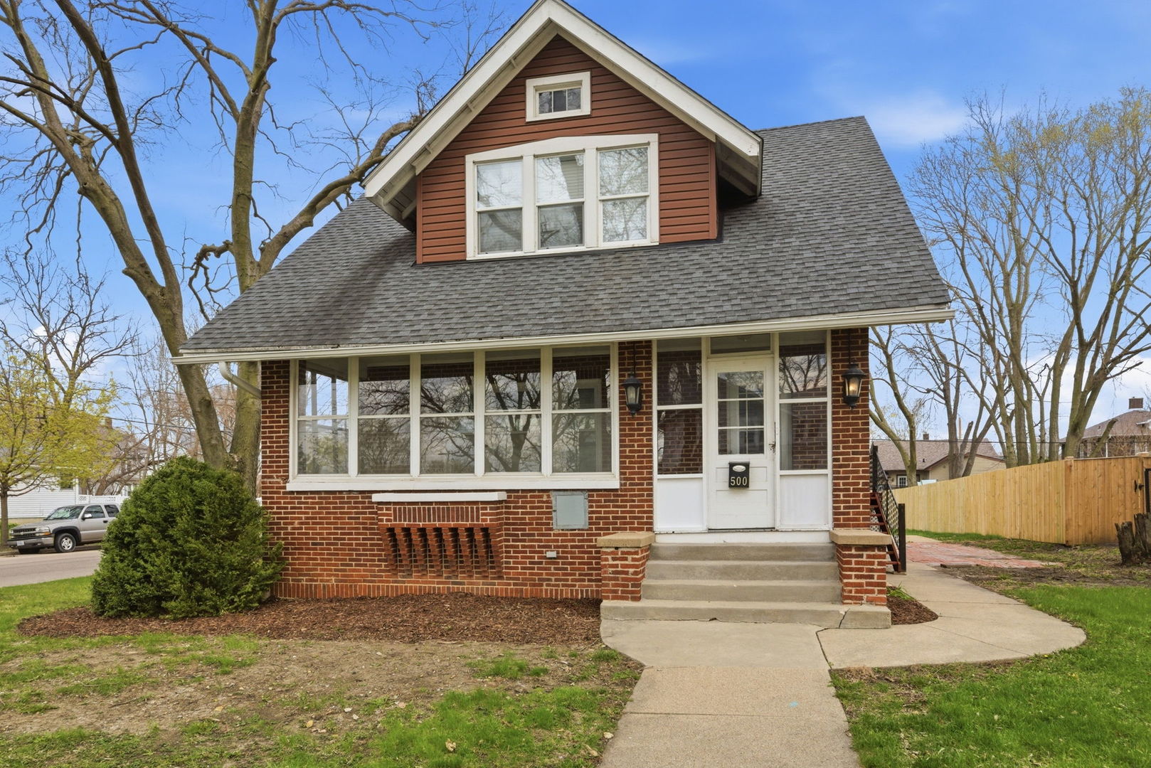 500 Catherine Street Ottawa, IL 61350 - Photo 2 of 23 a front view of a house with a yard
