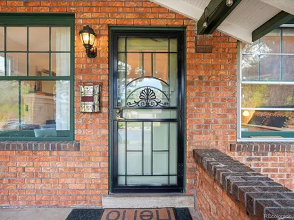 a view of a brick house with a window
