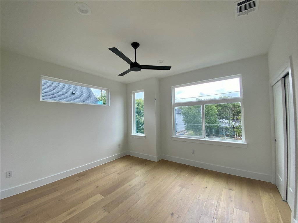 1118 Omega Avenue Austin, TX 78721 - Photo 12 of 19 2nd floor primary bedroom