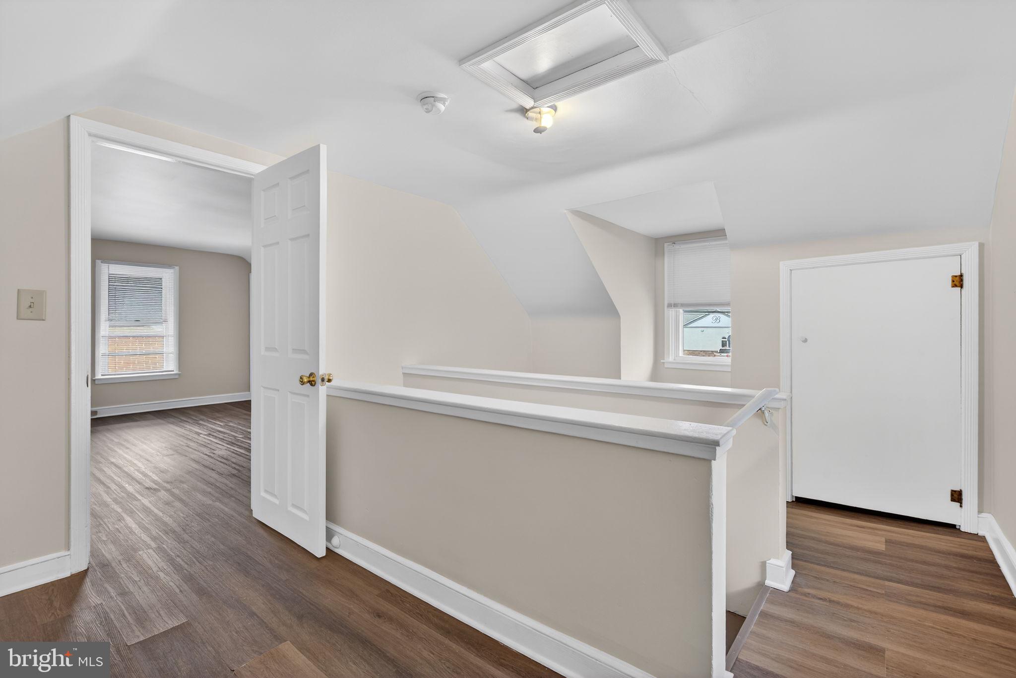 2527 North George Street York, PA 17406 - Photo 17 of 24 wooden floor in an empty room with a window