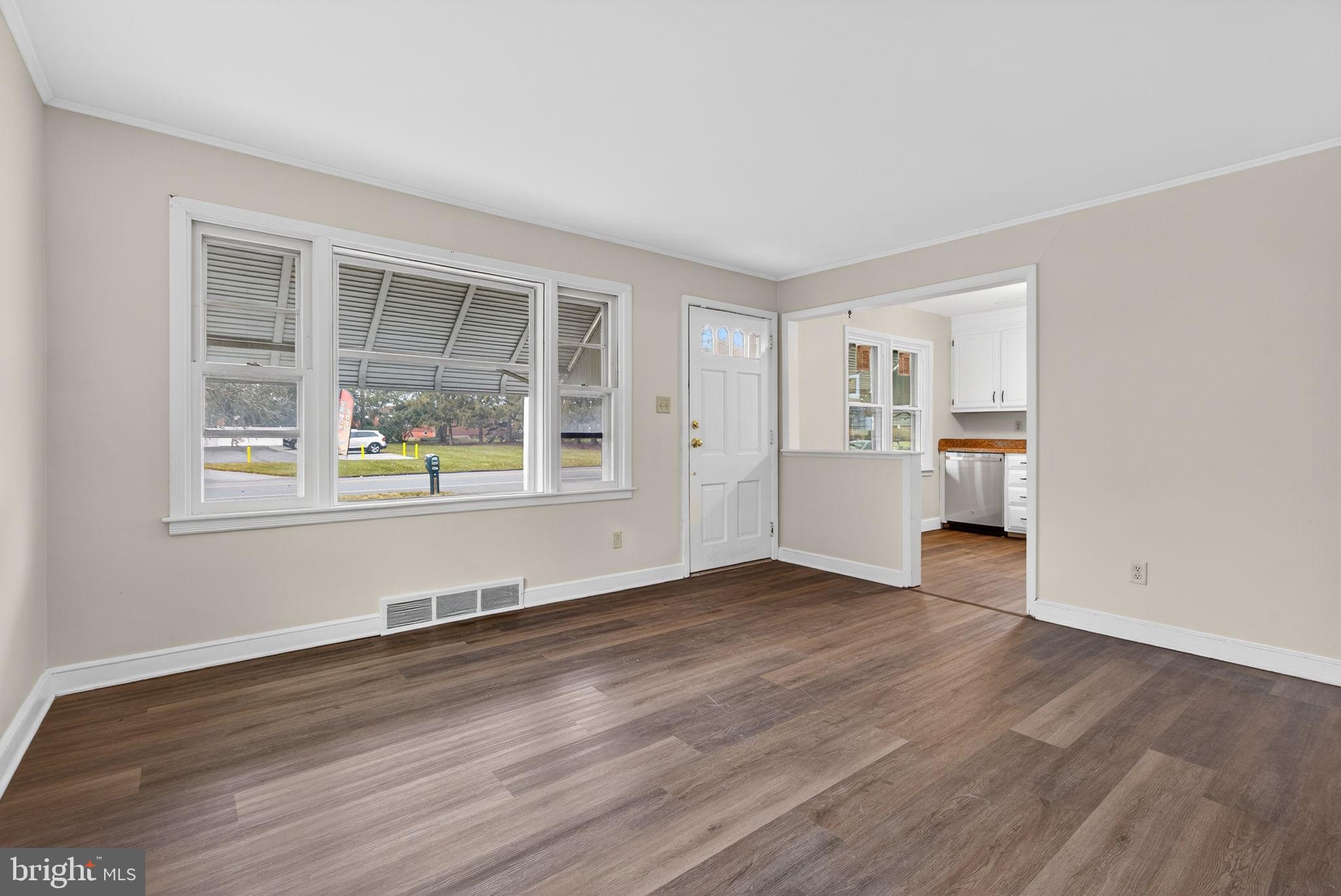 2527 North George Street York, PA 17406 - Photo 7 of 24 a view of empty room with wooden floor and fan